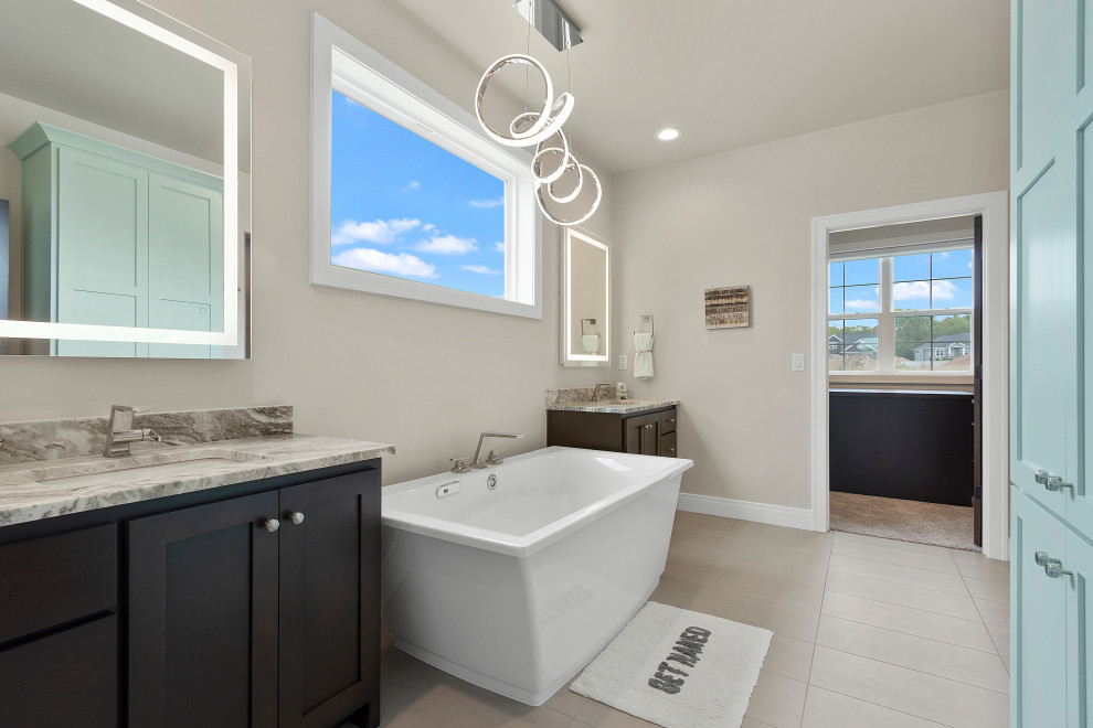 Example of a large transitional master ceramic tile, gray floor and double-sink bathroom design with shaker cabinets, medium tone wood cabinets, a two-piece toilet, gray walls, an undermount sink, marble countertops, green countertops and a built-in vanity
