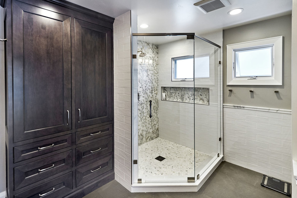Design ideas for a large transitional master bathroom in San Francisco with beaded inset cabinets, grey cabinets, a corner shower, a one-piece toilet, white tile, ceramic tile, beige walls, limestone floors, an undermount sink, marble benchtops, grey floor and a hinged shower door.