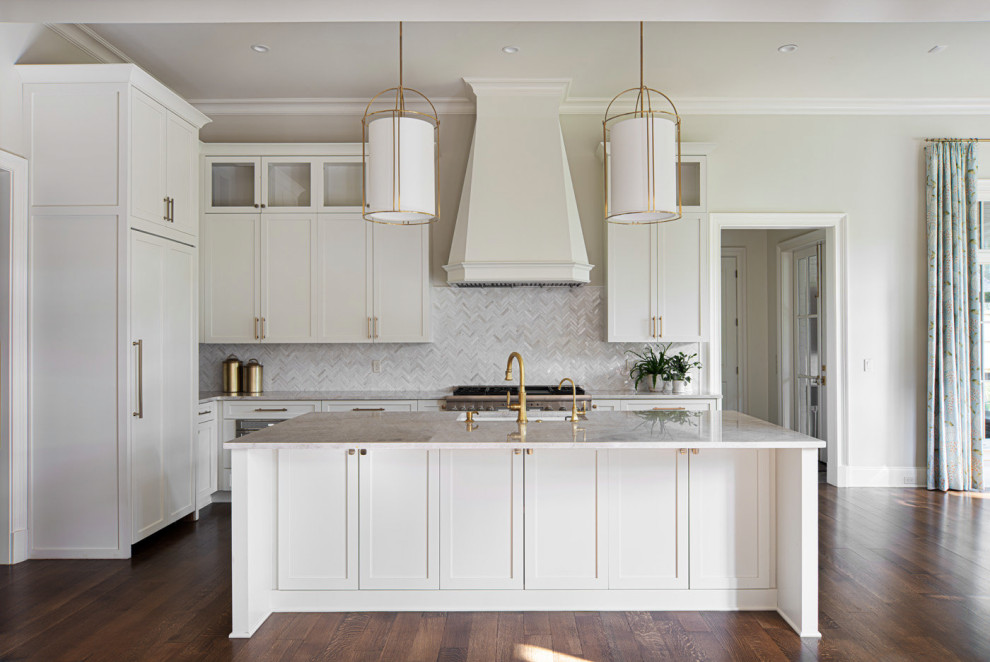 Design ideas for a large traditional single-wall open plan kitchen in Other with a drop-in sink, beaded inset cabinets, white cabinets, granite benchtops, white splashback, ceramic splashback, white appliances, plywood floors, with island, brown floor and beige benchtop.
