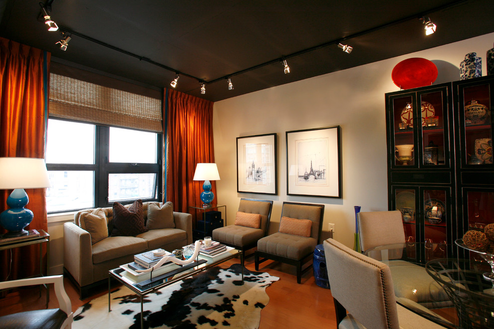 Example of a mid-sized transitional formal and enclosed ceramic tile living room design in Boston with beige walls, no fireplace and no tv