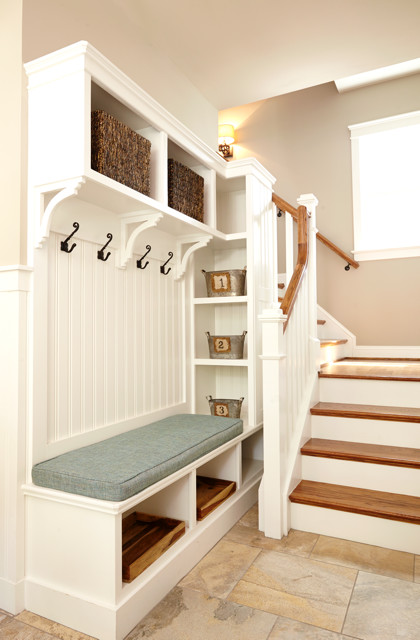 Mudroom - transitional ceramic tile mudroom idea in Charlotte with gray walls and a glass front door