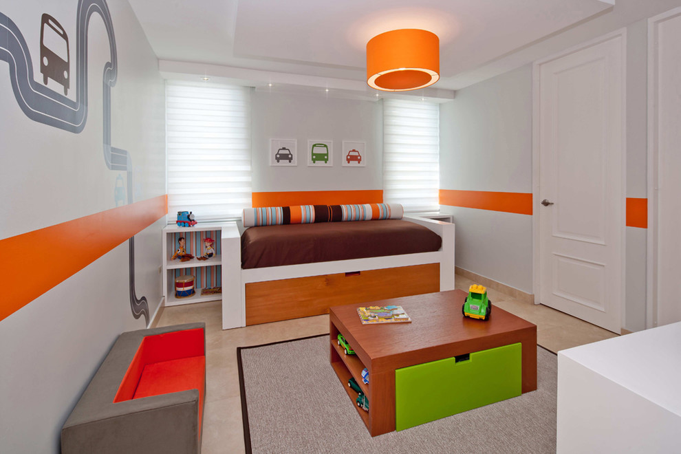 This is an example of a mid-sized contemporary kids' room for boys in Other with marble floors.