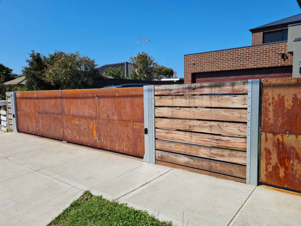 Corten BiFold Security Gates for wide driveway Rustic Melbourne by The