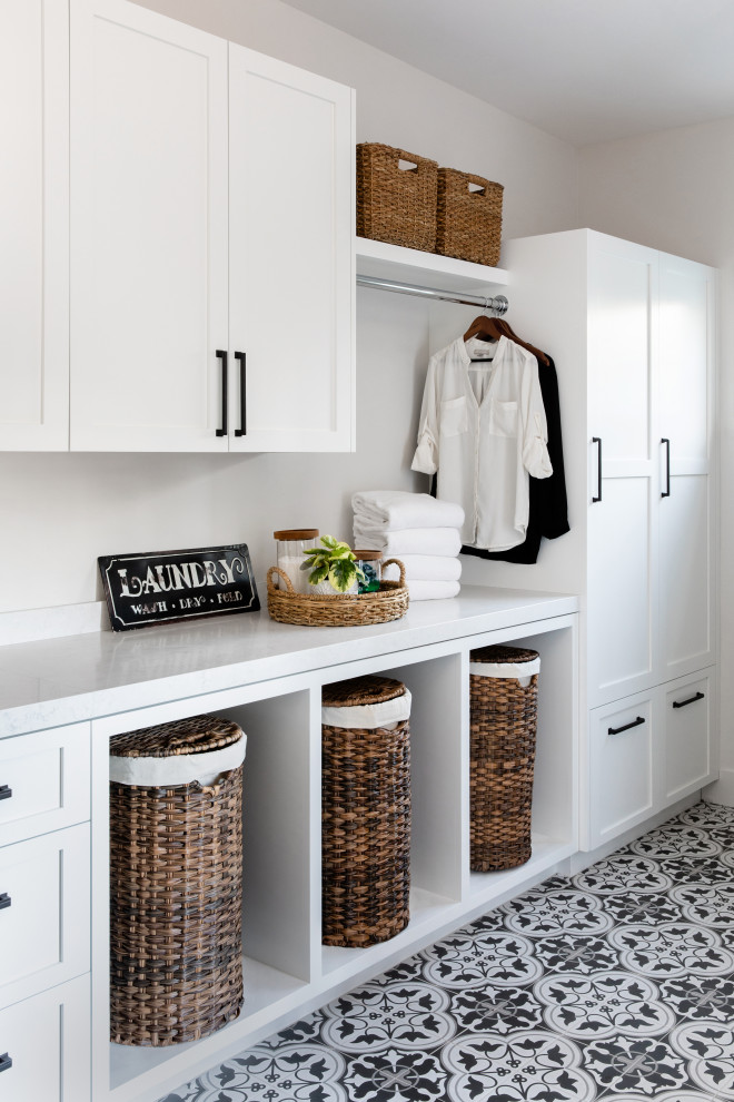 This is an example of a beach style laundry room in San Diego.