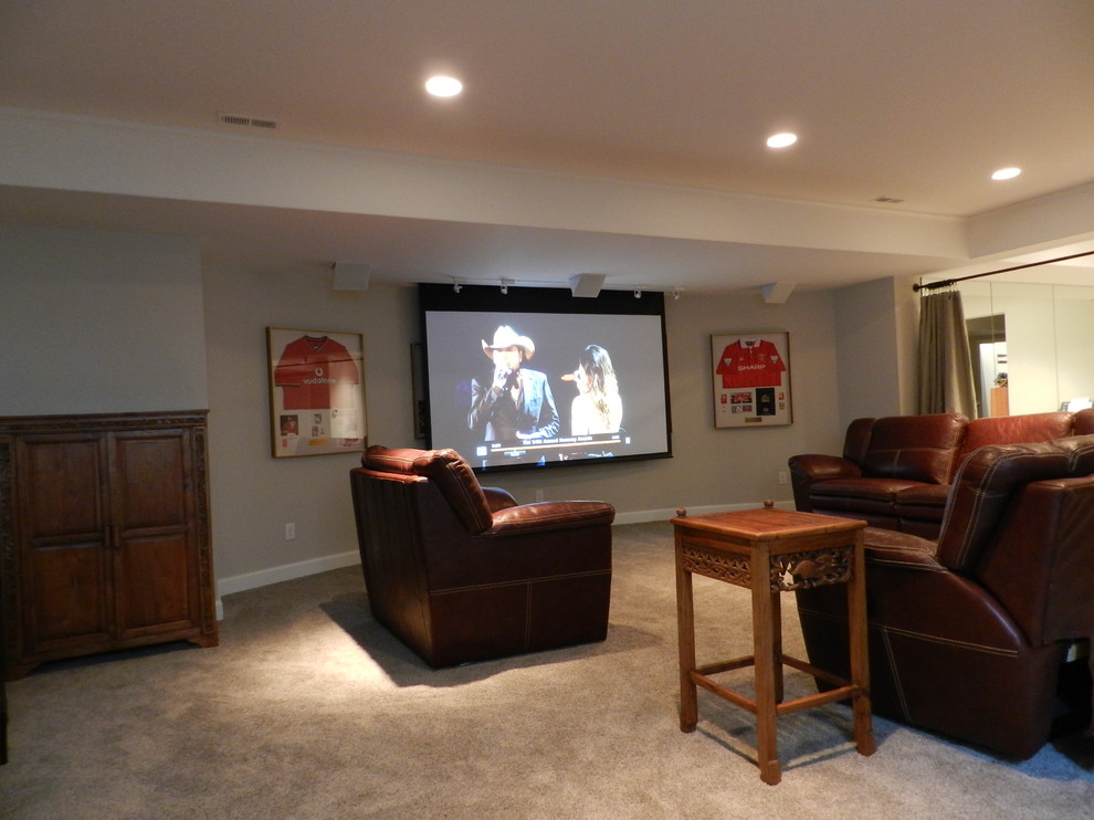 Design ideas for a mid-sized country enclosed home theatre in Columbus with a projector screen.