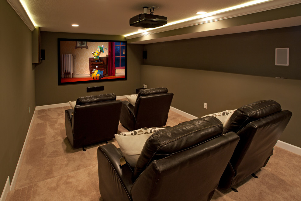 Inspiration for a traditional enclosed home theatre in Minneapolis with a projector screen, grey walls and beige floor.