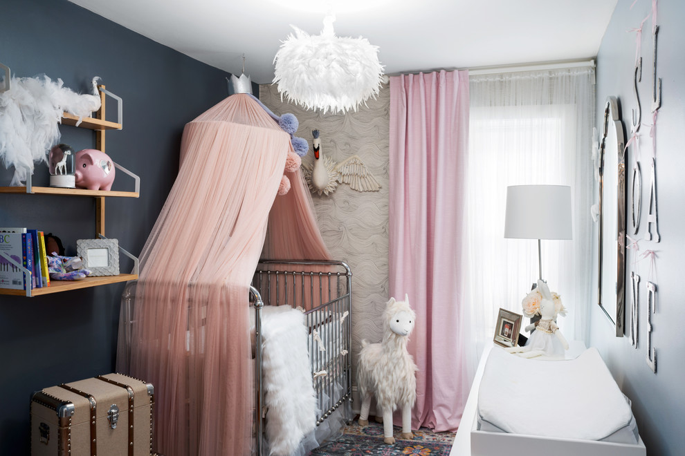 Design ideas for an eclectic nursery for girls in Philadelphia with blue walls.