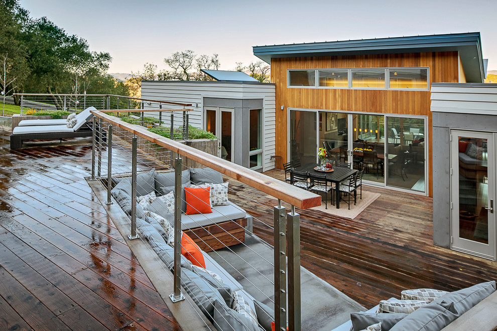 This is an example of a contemporary backyard deck in San Francisco with no cover.