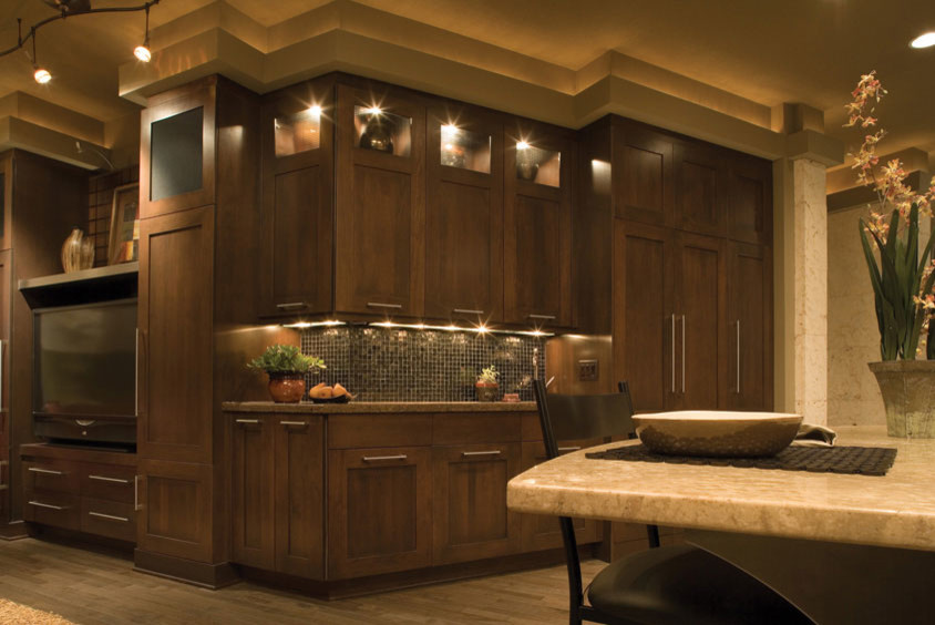 Inspiration for a large transitional u-shaped medium tone wood floor and beige floor eat-in kitchen remodel in Orange County with an undermount sink, shaker cabinets, dark wood cabinets, granite countertops, gray backsplash, mosaic tile backsplash, stainless steel appliances and an island