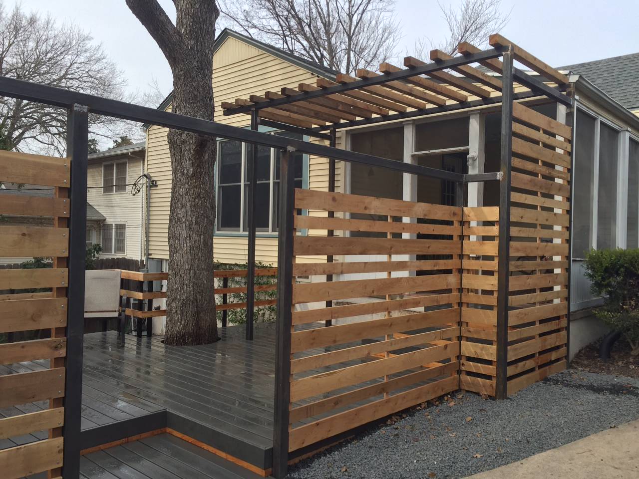 Modern composite decking, 2" steel posts w/ cedar fencing and canopy