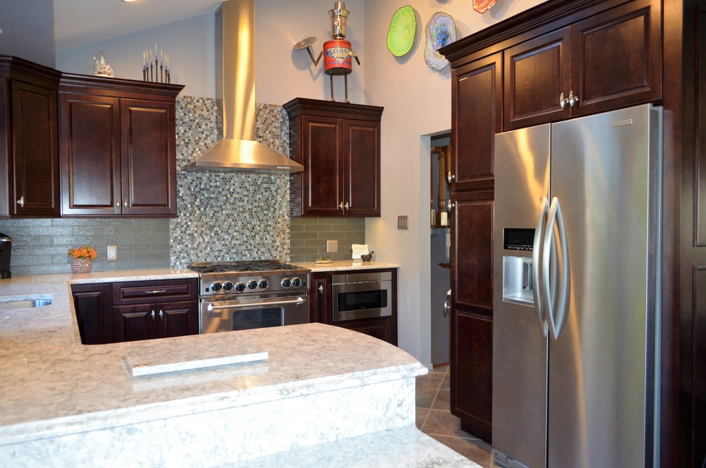 Example of a transitional kitchen design in New York