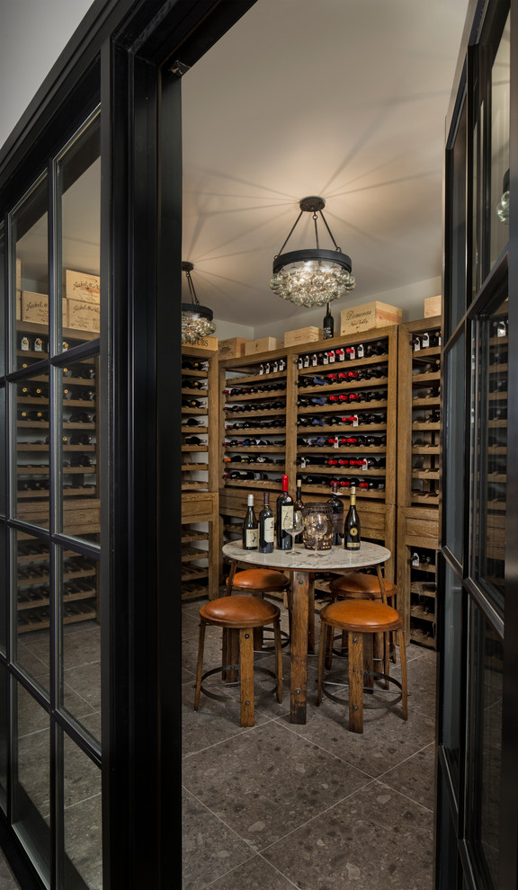 This is an example of a large transitional wine cellar in Detroit with storage racks.