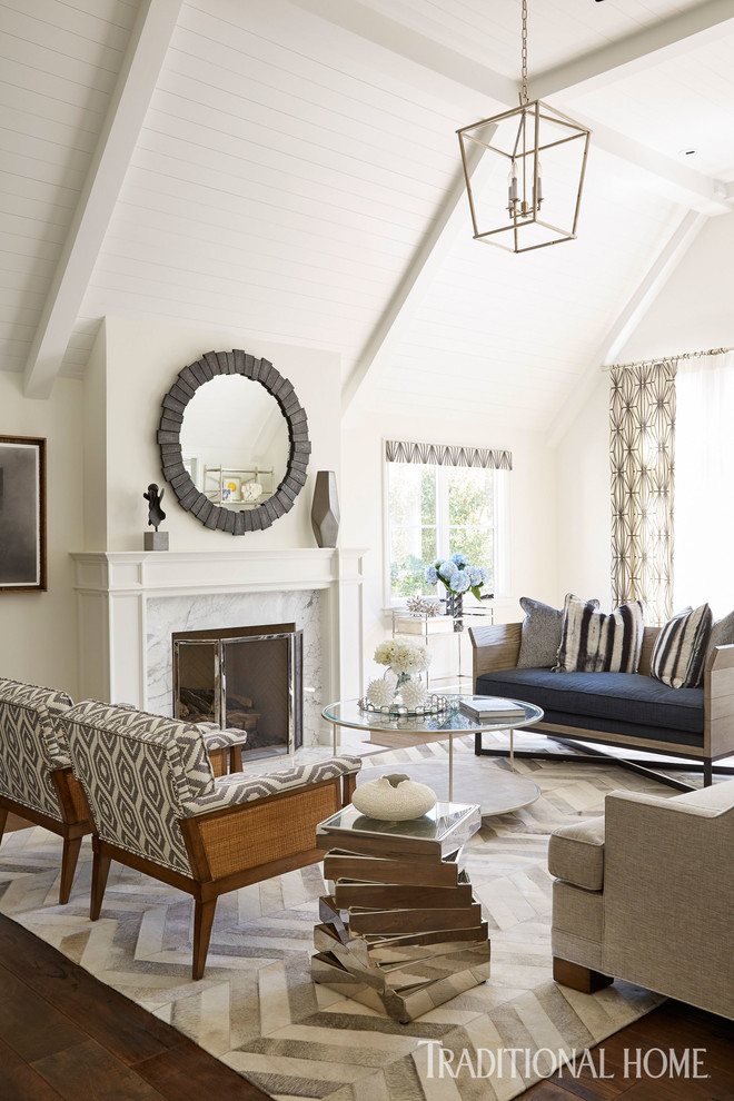 This is an example of a transitional living room in Los Angeles with a stone fireplace surround.