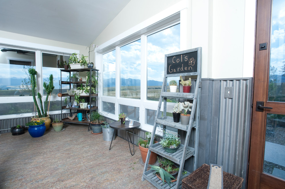 Large industrial sunroom in Other with linoleum floors.