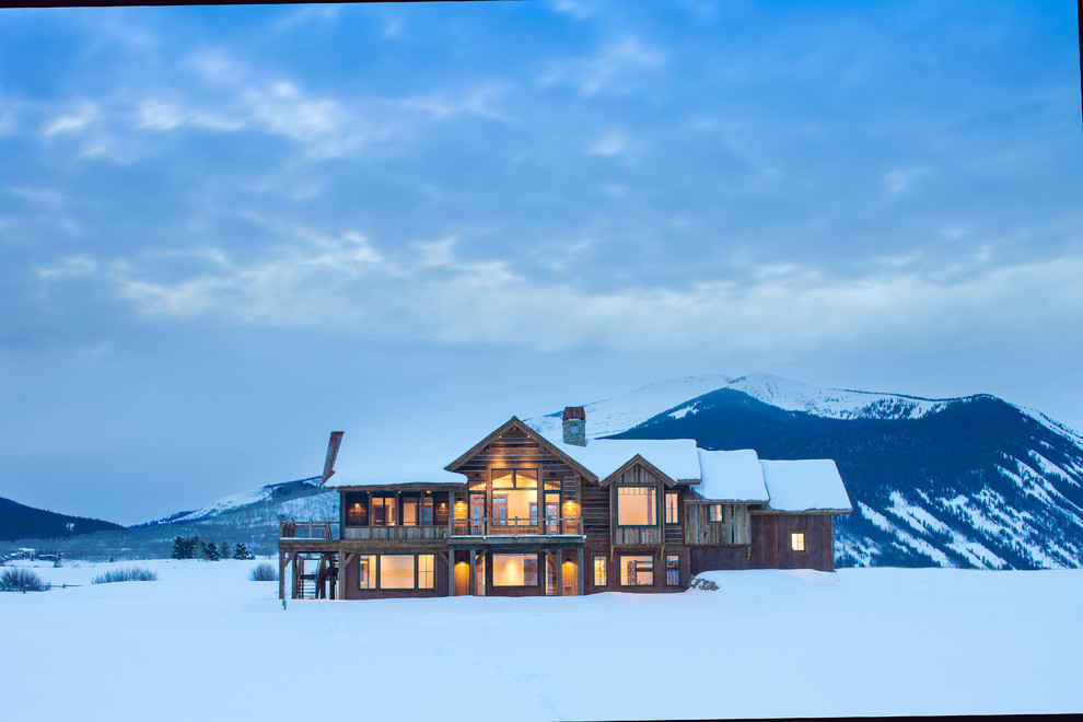 Mountain style home design photo in Denver