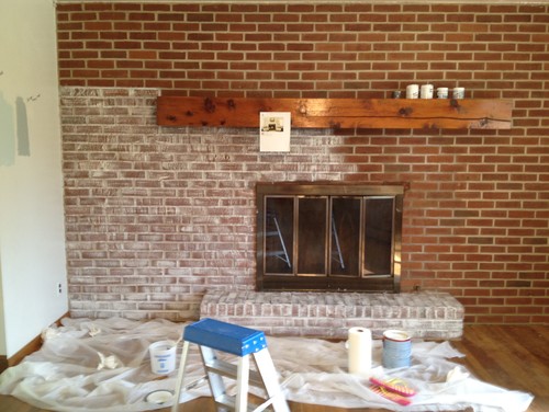 my house had a large wall of red brick with fireplace in living room
