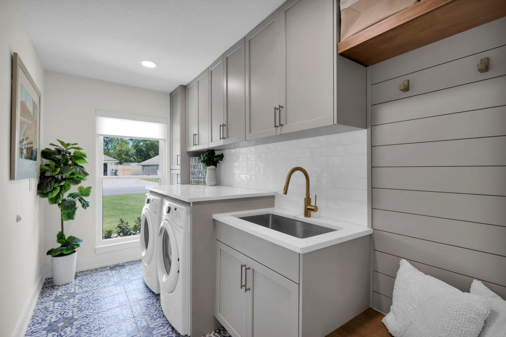Design ideas for a beach style laundry room in Jacksonville.