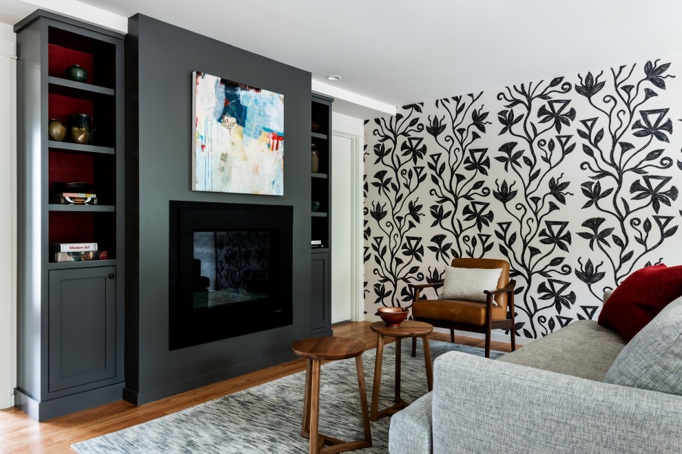 Small minimalist open concept wallpaper family room photo in Seattle with a standard fireplace and a plaster fireplace
