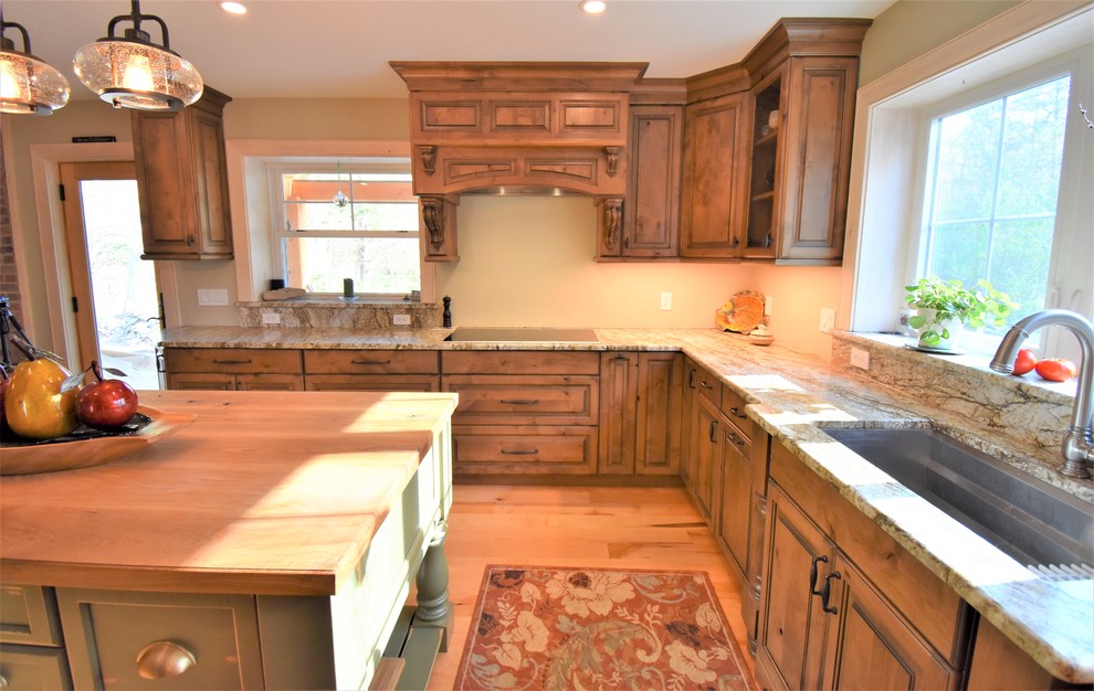Kitchen - huge rustic kitchen idea with distressed cabinets