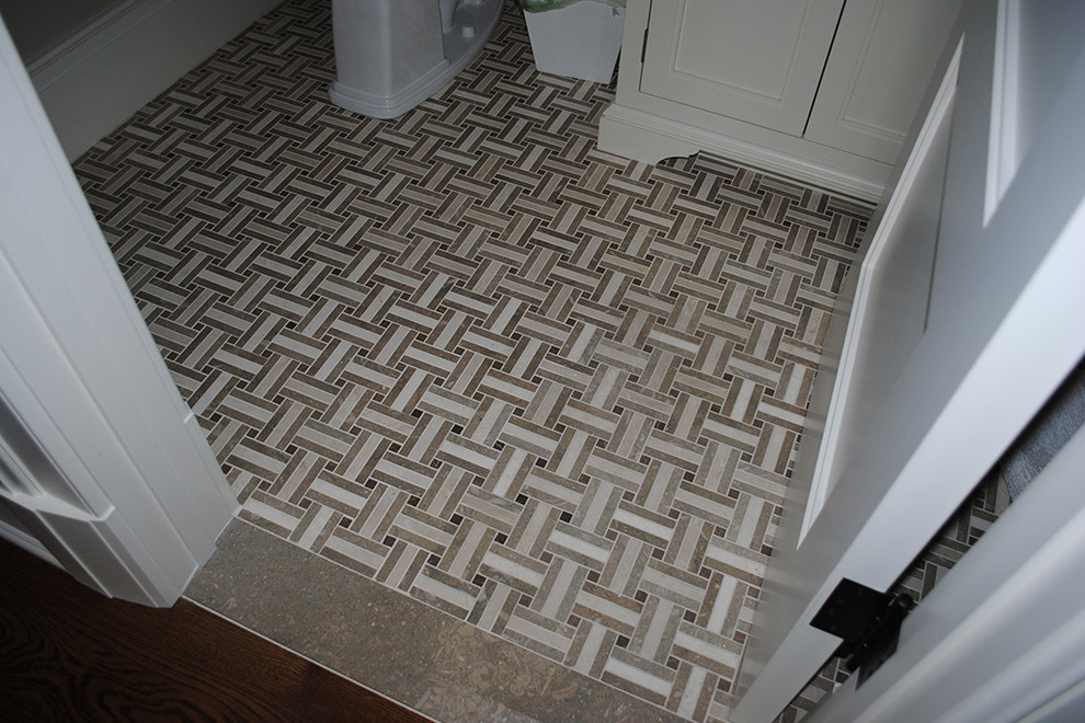 Example of a large transitional master multicolored tile and mosaic tile marble floor and beige floor freestanding bathtub design with flat-panel cabinets, dark wood cabinets, beige walls, an undermount sink, marble countertops and a hinged shower door