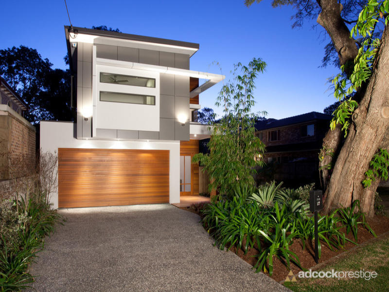 This is an example of a mid-sized contemporary two-storey white house exterior in Brisbane with mixed siding and a hip roof.