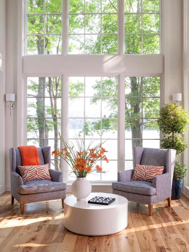 Large transitional open concept light wood floor and beige floor sunroom photo in Boston with no fireplace and a standard ceiling