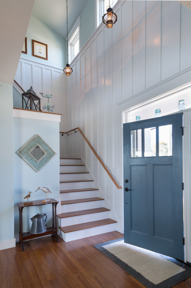 Beach style foyer in Providence with blue walls, a single front door and a blue front door.