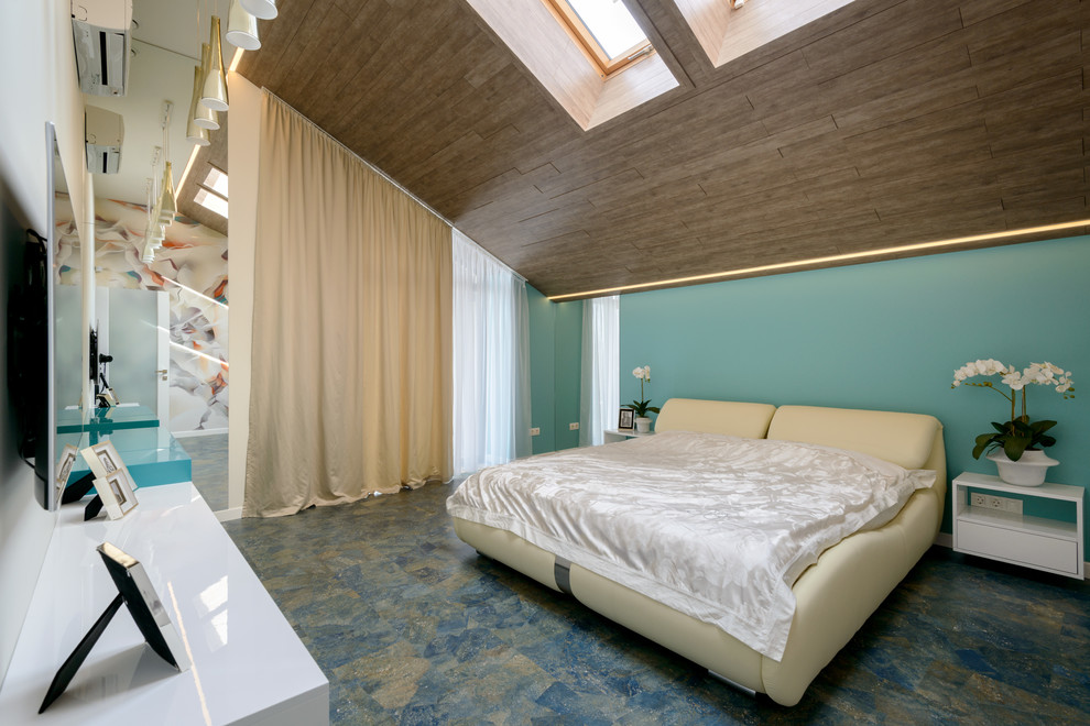 This is an example of a mid-sized contemporary master bedroom in Novosibirsk with multi-coloured walls and cork floors.