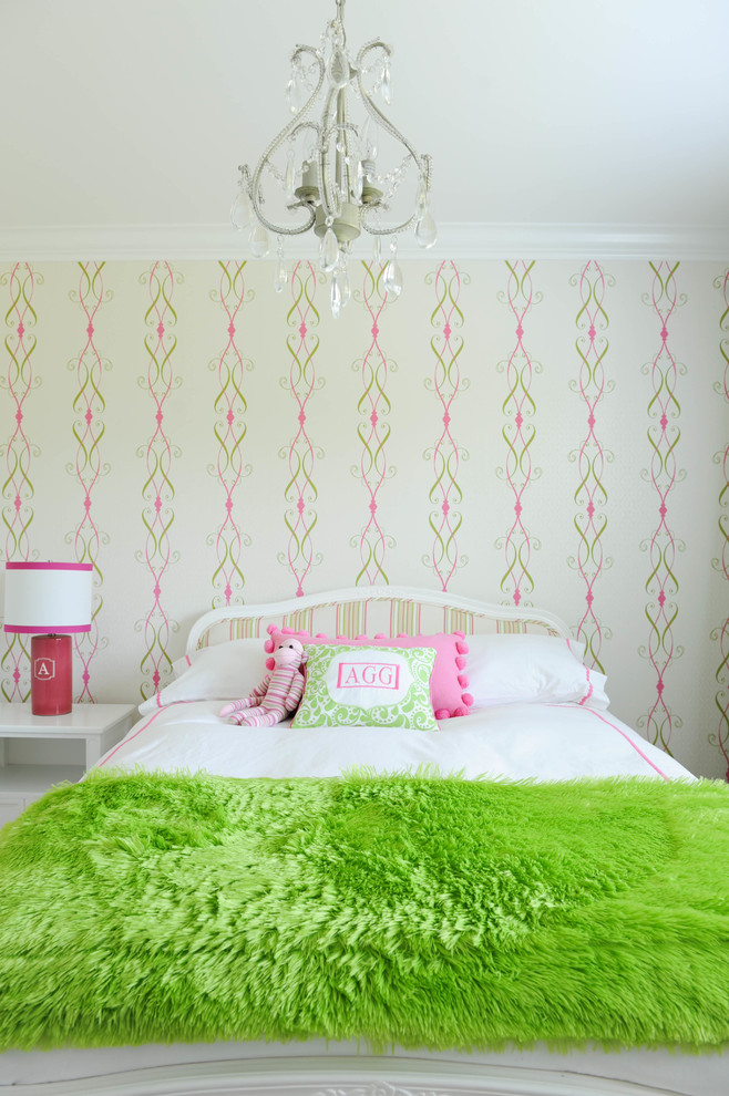 Transitional kids' bedroom in Vancouver with multi-coloured walls for girls.