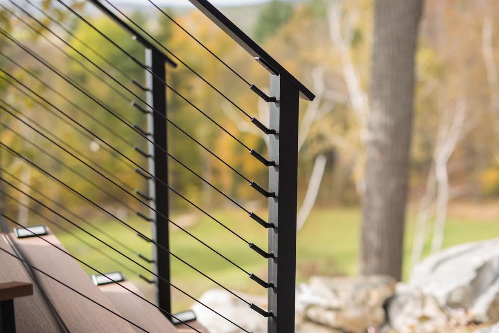 Staircase - large rustic wooden straight cable railing staircase idea in Boston with wooden risers