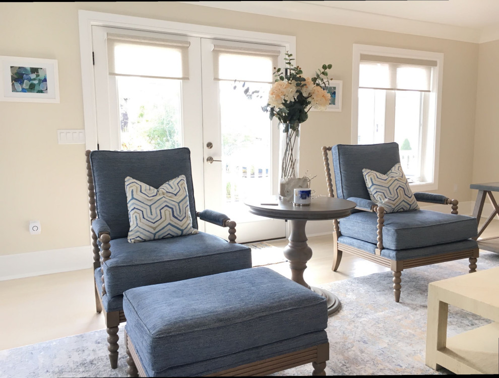 Mid-sized transitional open concept family room in Bridgeport with light hardwood floors, a home bar, beige walls, no fireplace, a built-in media wall and beige floor.