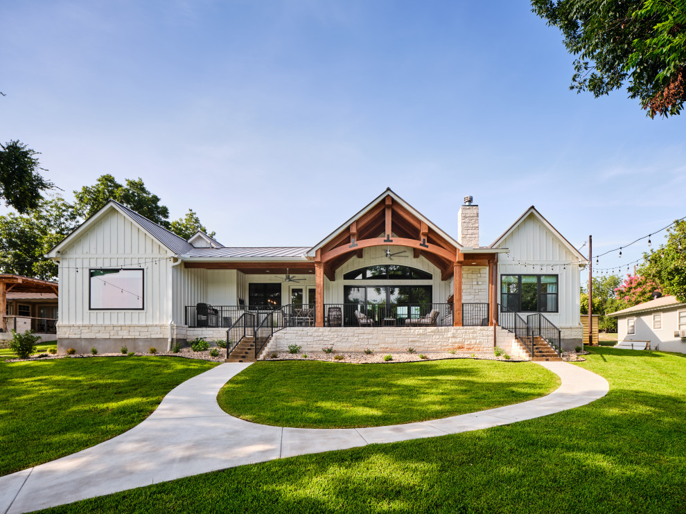Example of a beach style home design design in Austin