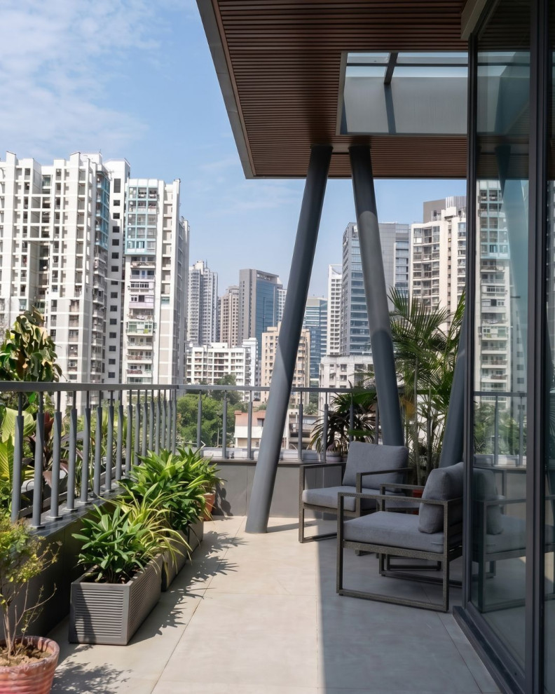 This is an example of a contemporary terrace & balcony in Delhi.