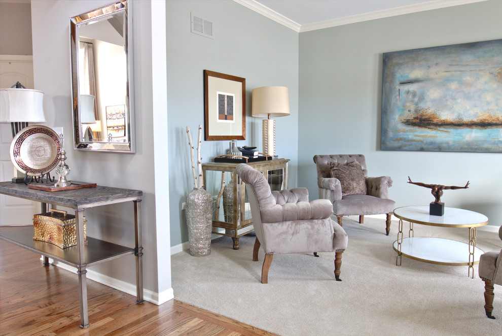 Trendy medium tone wood floor foyer photo in Chicago with gray walls