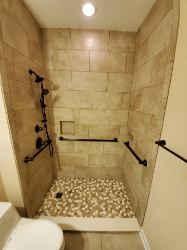 Photo of a small classic shower room bathroom in Raleigh with a walk-in shower, a one-piece toilet, beige tiles, ceramic tiles, beige walls, ceramic flooring, beige floors, a shower curtain, a wall niche, a single sink and a built in vanity unit.
