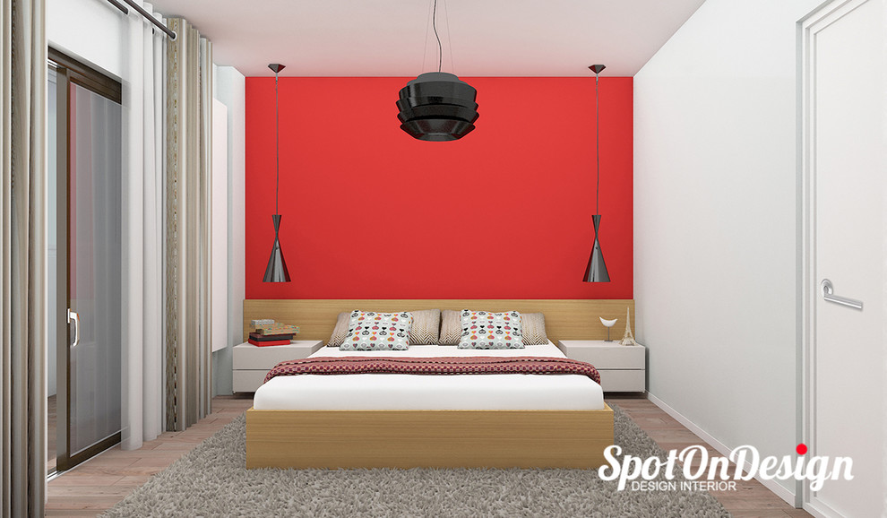 Mid-sized modern master bedroom in Other with red walls and medium hardwood floors.