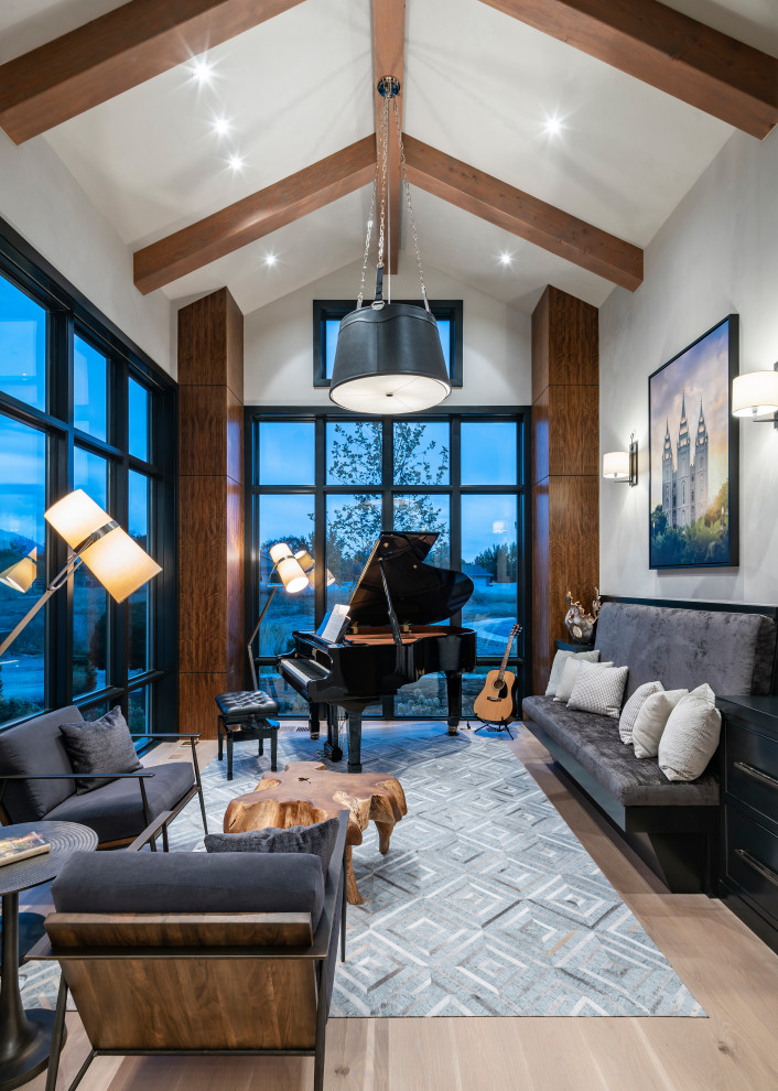 Inspiration for an expansive country open concept living room in Salt Lake City with a music area, white walls, light hardwood floors, no fireplace, no tv and beige floor.