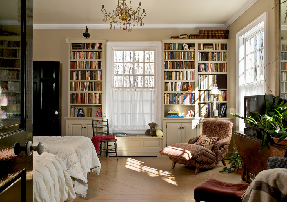 Design ideas for a country gender-neutral teen room in New York with beige walls and light hardwood floors.