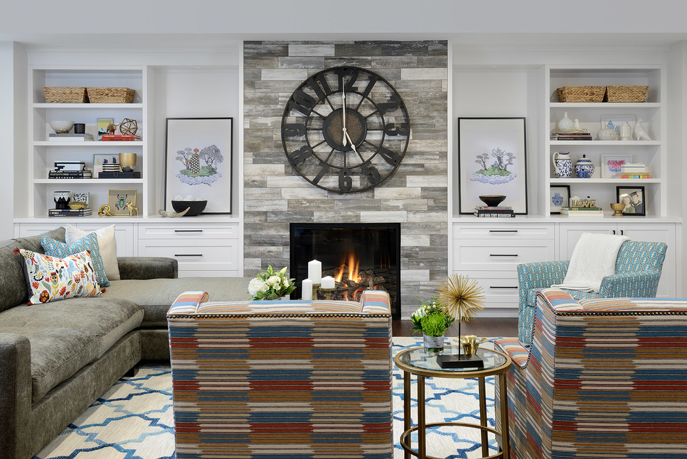 Design ideas for a large transitional look-out basement in Toronto with white walls, dark hardwood floors, a standard fireplace and a tile fireplace surround.