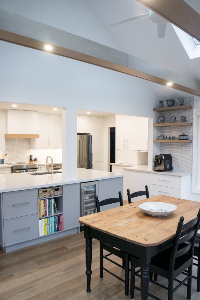 Example of a transitional kitchen design in Toronto