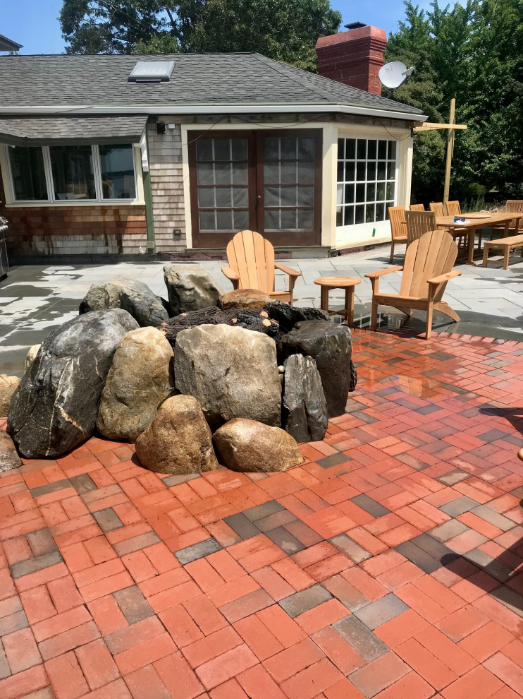 Custom Boulder Firepit and Patio
