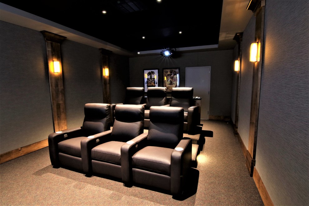 Design ideas for a mid-sized modern enclosed home theatre in Baltimore with beige walls, carpet, a projector screen and brown floor.