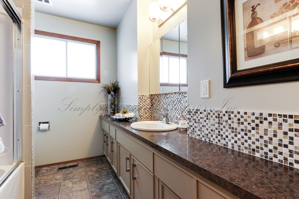 Example of a transitional bathroom design in Edmonton