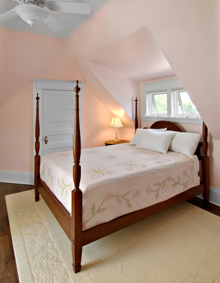 Arts and crafts master bedroom in Minneapolis with pink walls and dark hardwood floors.