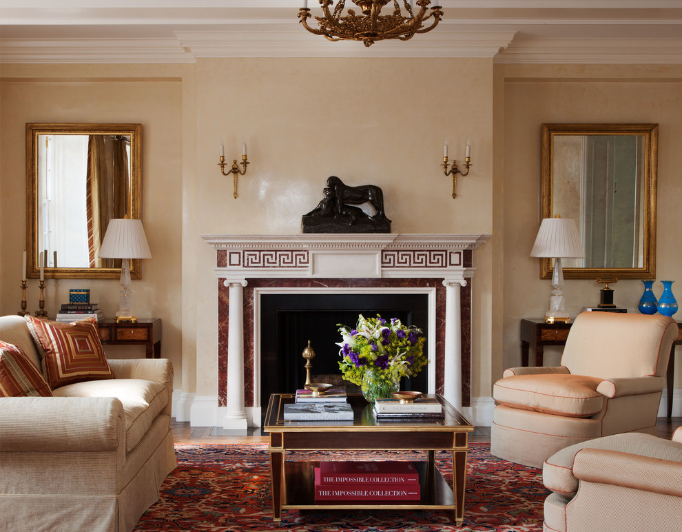 This is an example of a traditional formal living room in New York with beige walls, a standard fireplace and no tv.