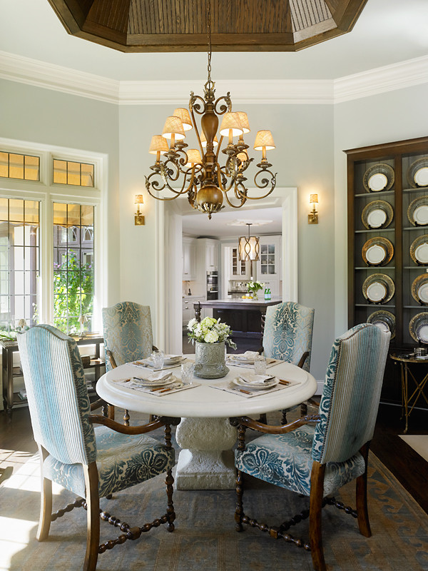 Inspiration for a mid-sized traditional separate dining room in Chicago with grey walls, carpet and no fireplace.