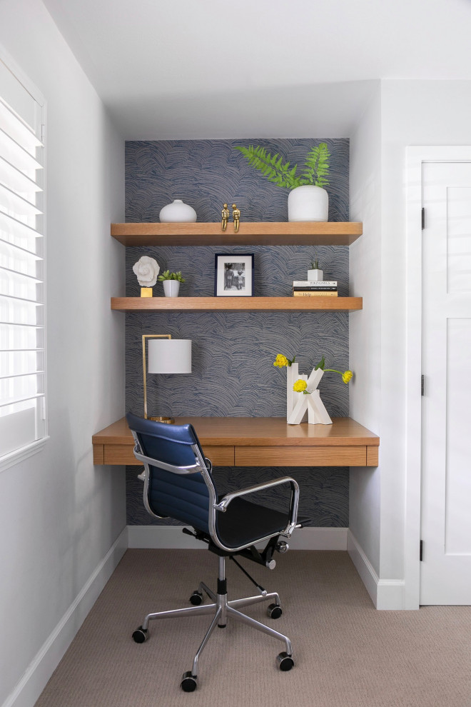 Transitional home office in San Francisco with grey walls, carpet and a built-in desk.