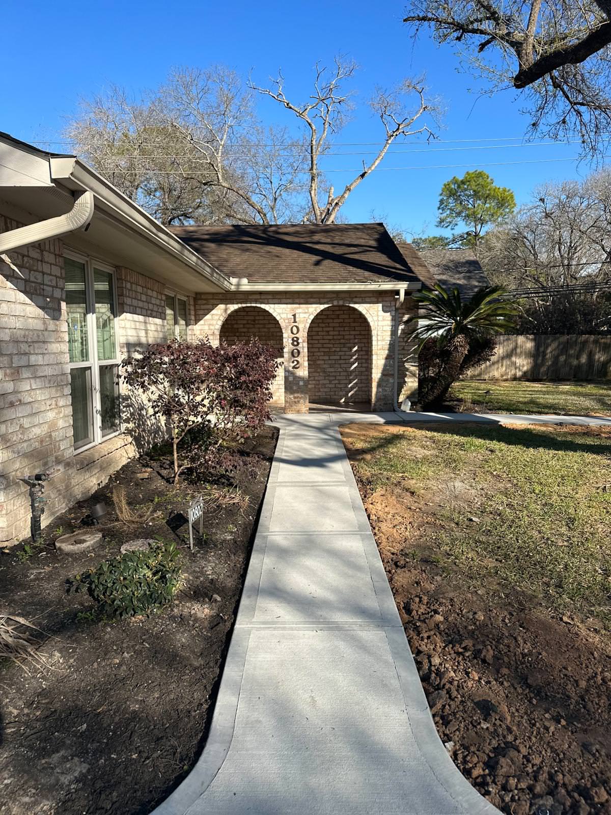 New driveway with sidewalks and stamped concrete!