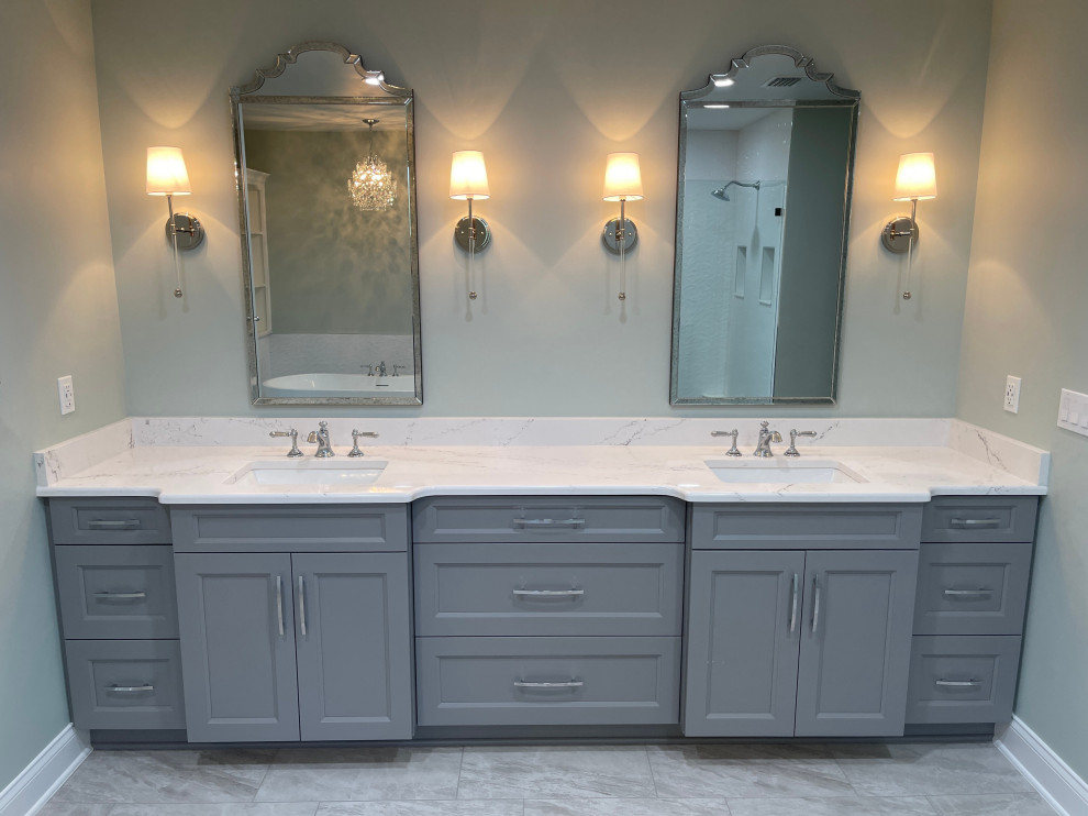 Photo of a mid-sized contemporary master bathroom in Tampa with shaker cabinets, grey cabinets, an undermount sink, engineered quartz benchtops, a double vanity and a built-in vanity.