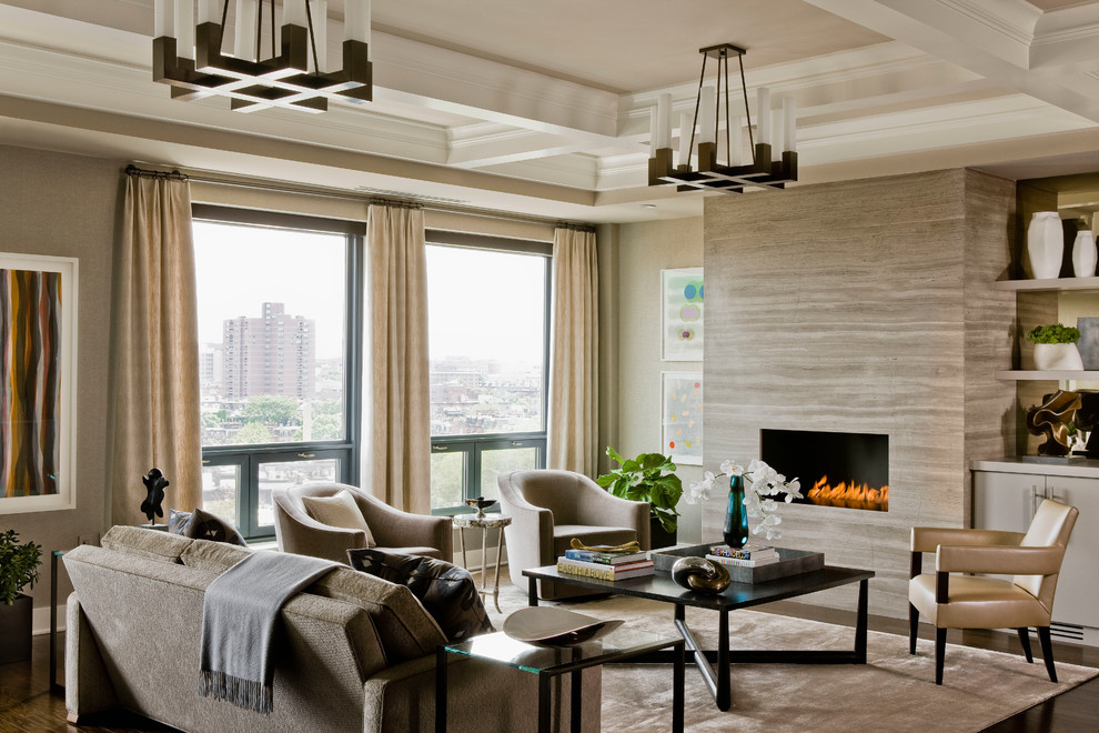 This is an example of a large contemporary formal open concept living room in Boston with beige walls, medium hardwood floors and a standard fireplace.